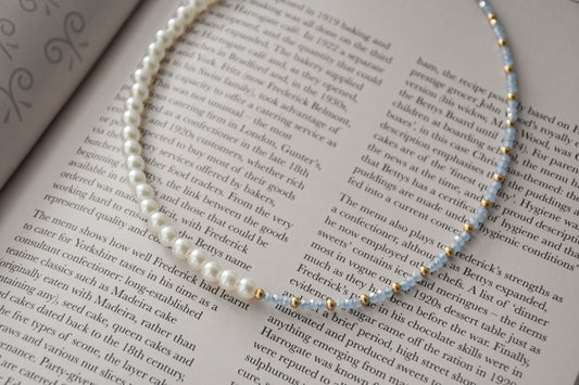 Blue and pearl imbalance necklace